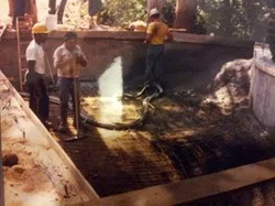 Lindwalt Construction crew pouring concrete on-site for a commercial foundation